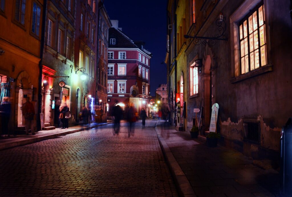 Londonderry Pedestrian Accident lawyer features photo of a busy new hampshire street at night taken in a time lapse 